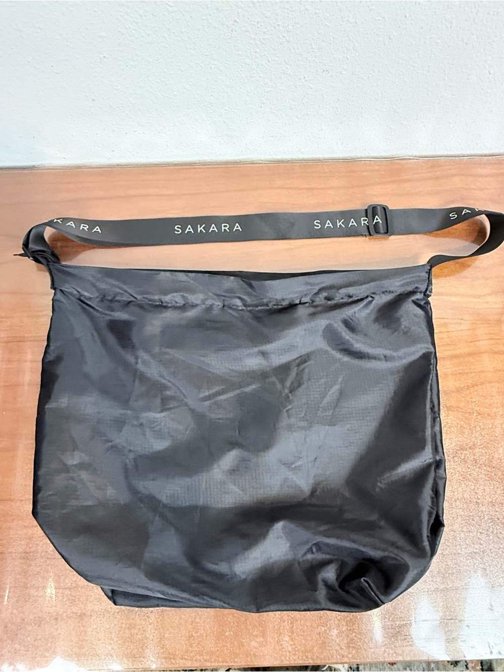 Sakara Black Lightweight Crossbody Zip Up Packable Bag